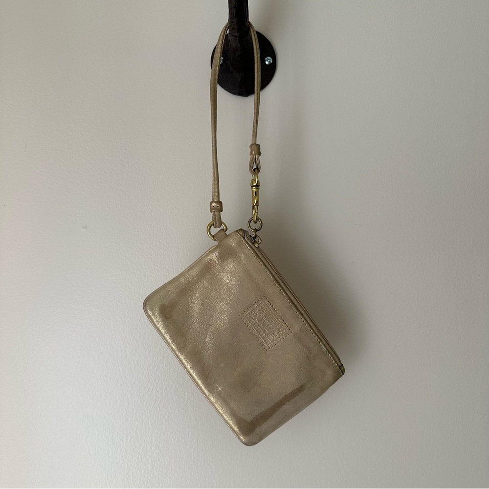 Coach Poppy gold shimmery wristlet